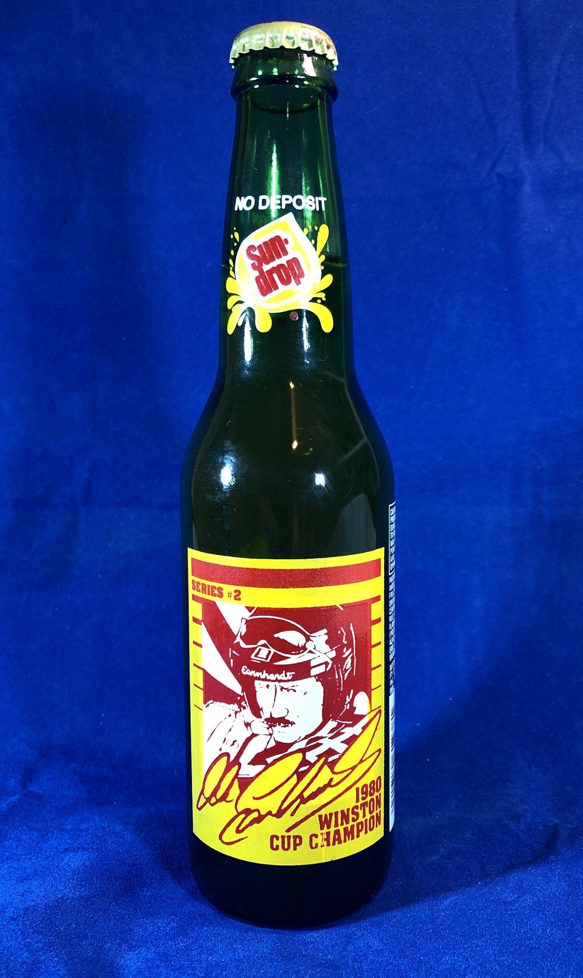 Vintage SUN-DROP bottle. SUN DROP Dale Earnhardt 1980 NASCAR Winston Cup Champion, Series #2, Unopened