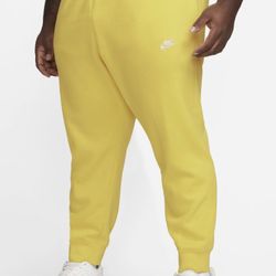 Yellow Nike jogger sweats 