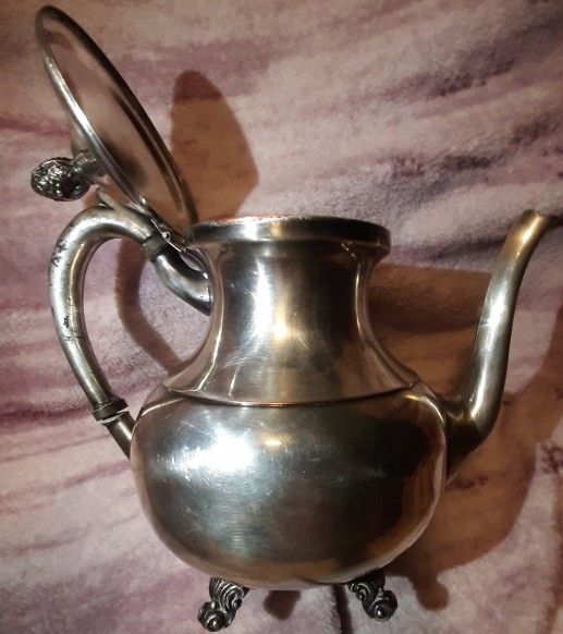 Crosby silver plated on copper teapot