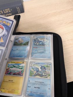 Pokémon Trading Cards in Binder
