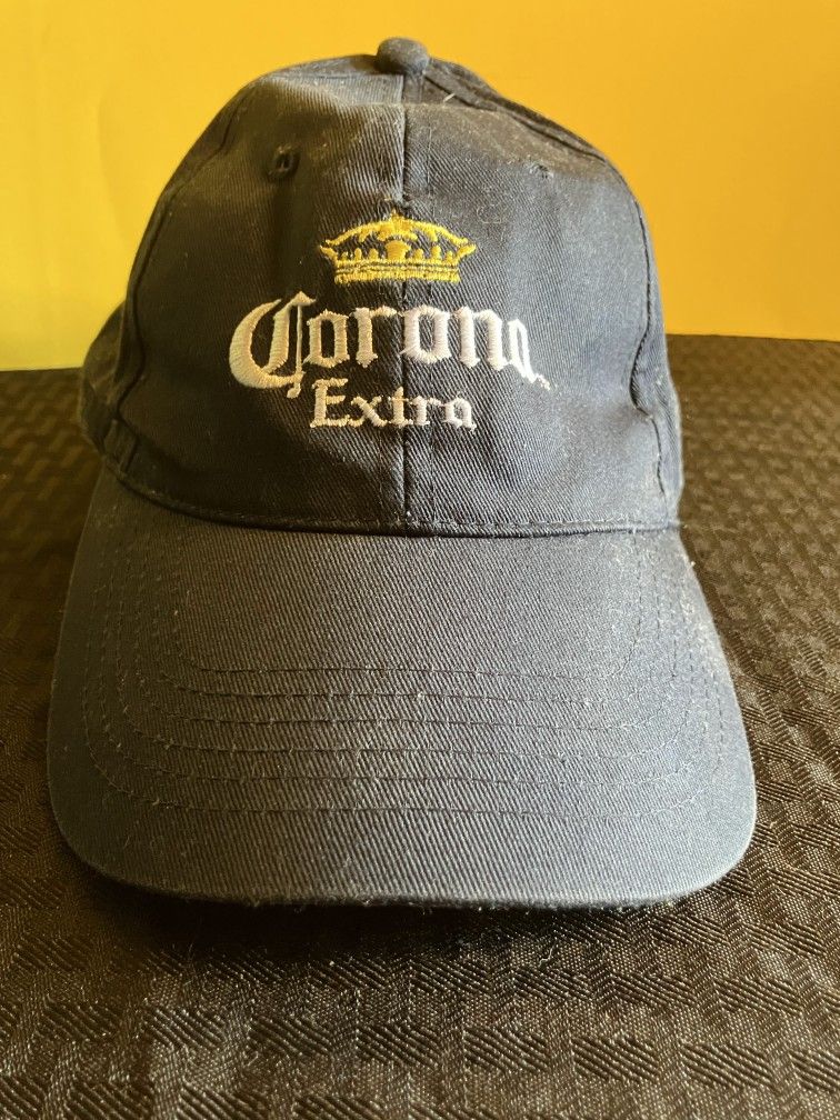 Corona Extra Embroided Baseball Cap. Blue, Gold & White Adjustable Strap