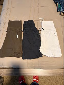 Young men’s cargo pants 2 size Large and 1 medium good condition $5 for all 3