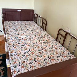 All electric Invacare hospital bed w memory foam mattress - like new