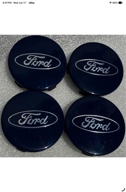 Set of 4 Authentic OEM FoMoCo center caps. They are the Blue Oval finish caps and will fit most F150 and Expedition alloy wheels from 2012-2018. Ford 