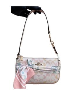 Coach nolita with bow