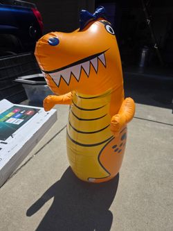 3ft tall Punching Dinosaur