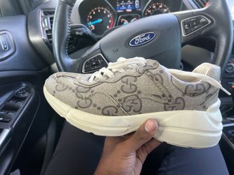 Gucci GG Supreme Rhyton Sneakers