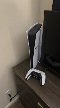 PlayStation 5 with one controller