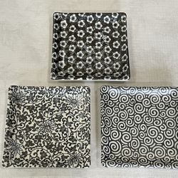 Set of three Kanesada Japanese stoneware condiment dishes with black and white patterns. 5”x 5”