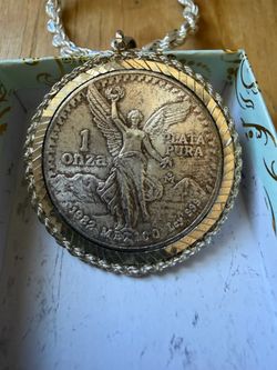1982 Libertad on a .925 Bezel