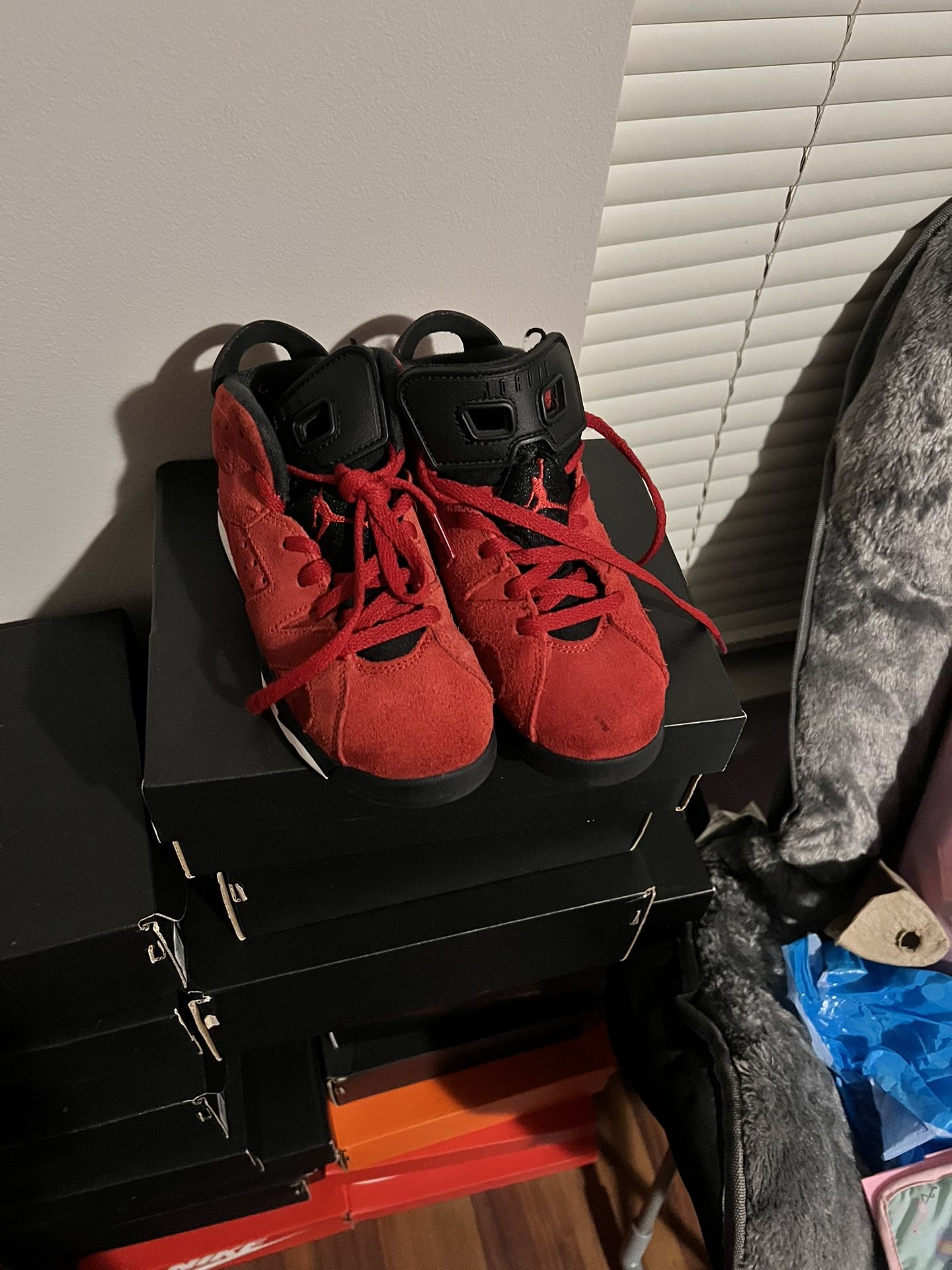 Red and black 6’s size 12c kids