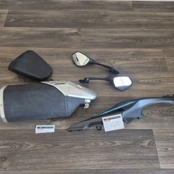 2024 GXR-1000R parts, OEM slip on exhaust, passenger seat, both mirrors and extra fairing