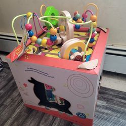 Wooden Activity Cube. 