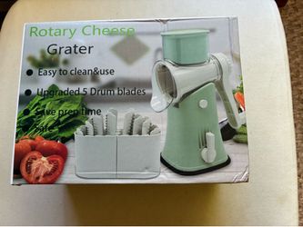 Rotary Cheese Grater with 5 blades.