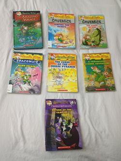 7 PAPER BACK GERONIMO STILTON BOOKS