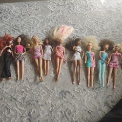 Barbies And A Ken