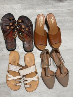 4 pairs of sandals size 8. All them for $8 Dlls