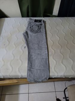 Grey and black true religion jeans