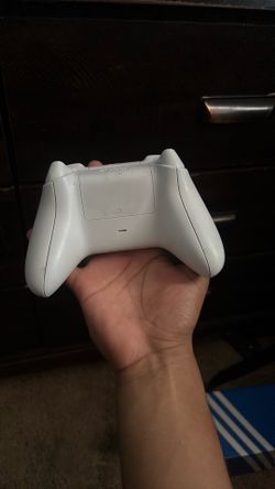 white x-box and blue x-box controller