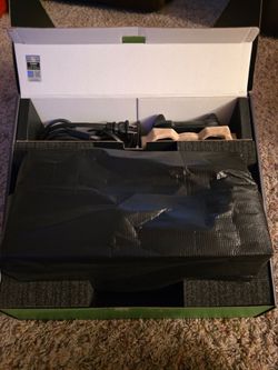XBOX Series X with controller and cables
