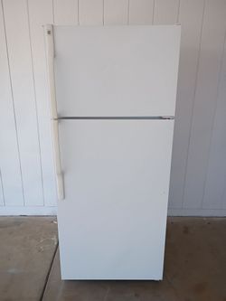 GE, White Refrigerator. Wide 28"     Depth 28"      Tall67"