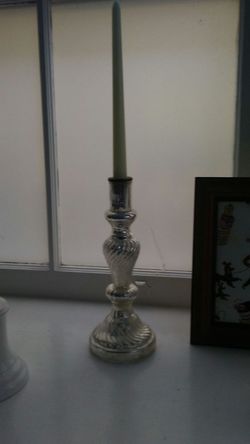 Candle in glass in antique glass