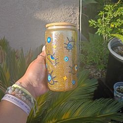 Gold Fine Glitter Eye Design Snowglobe Cup