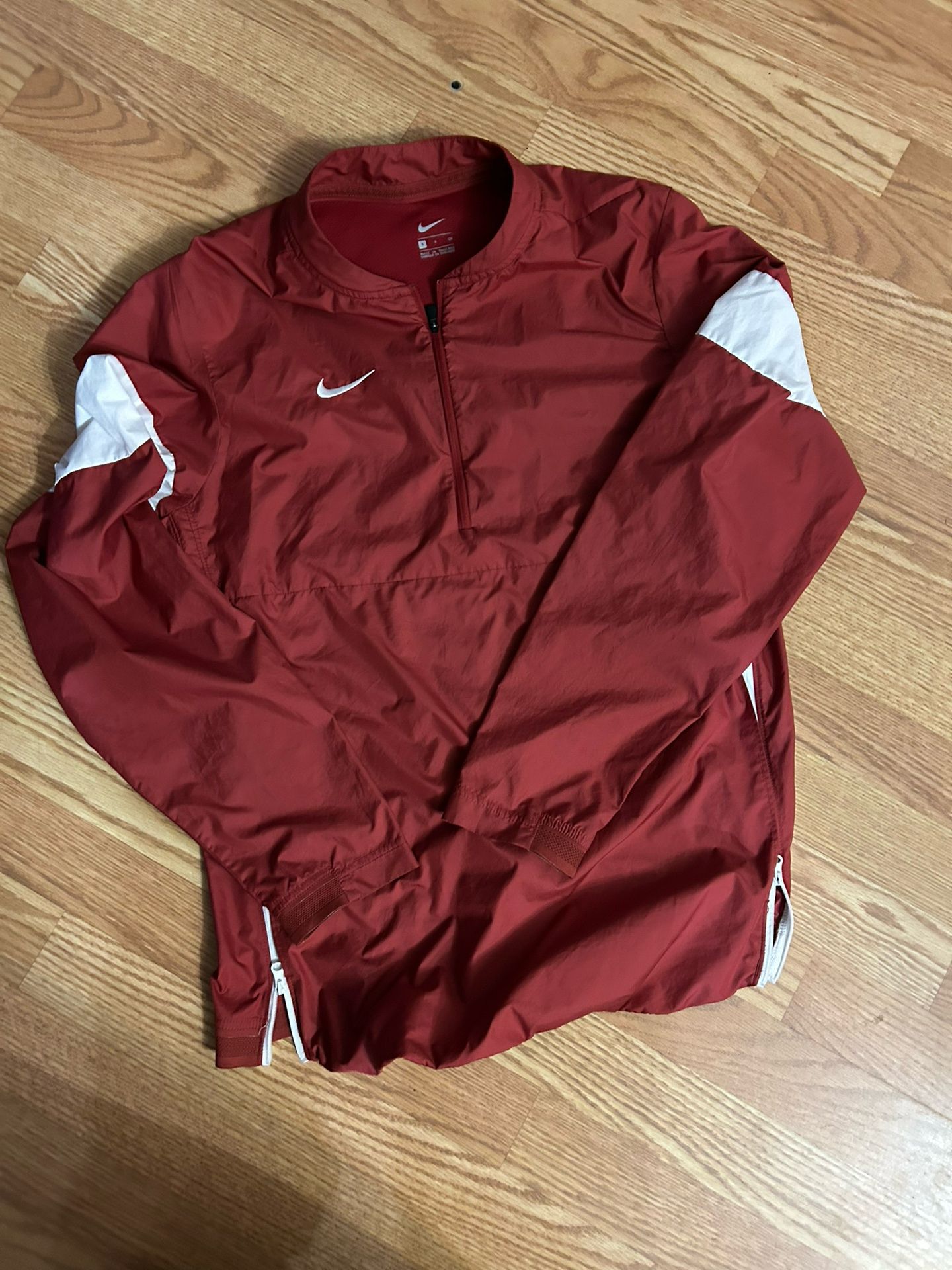 Small red Nike windbreaker