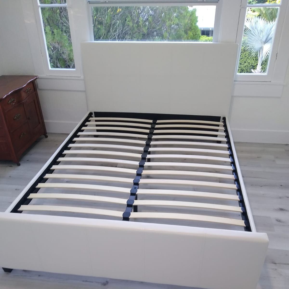 Queen size bed frame new in the box. Free delivery and free set up