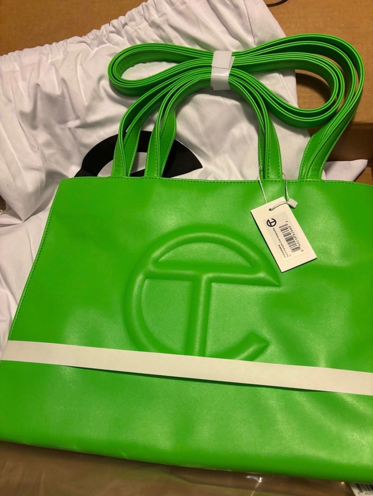 a medium Telfar new in green screen 