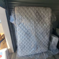 Almost new double mattress and frame