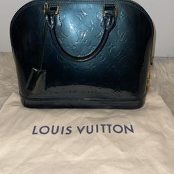 Louis Vuitton Alma Handbag