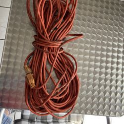 The extension cord is in good condition and measures 100 feet long.