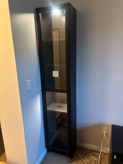 IKEA BILLY / OXBERG Glass-Door Cabinet (narrow model) in Black-Brown / Black Oak Effect.