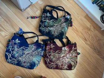 Peacock handbags (3)