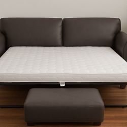 Convertible Faux Leather Sofa + Ottoman – Pull-Out Bed, Sleek & Comfy!