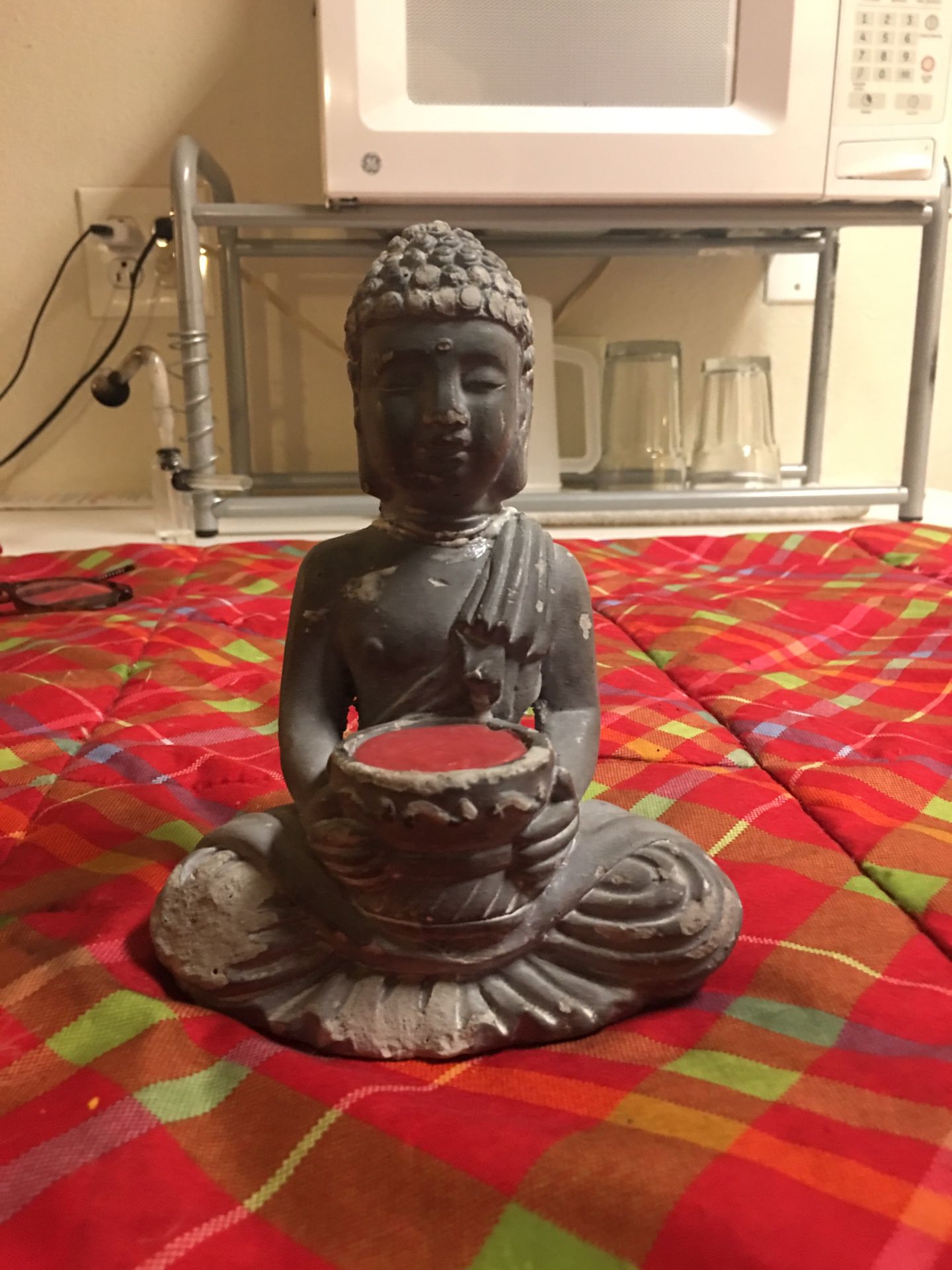 Small grey Buddha statue candle holder