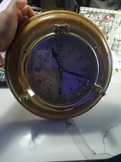Vintage 1980s Quartz Nautical Porthole Hanging Clock. Wood And Brass. Vintage 1980s Quartz Nautical Porthole Hanging Clock. Wood And Brass. Condition.