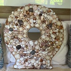 Shell mirror, clam shaped, coastal, wallhanging.  22 x24”.  Delray.