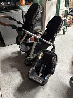 Double Stroller With Baby Carry-On