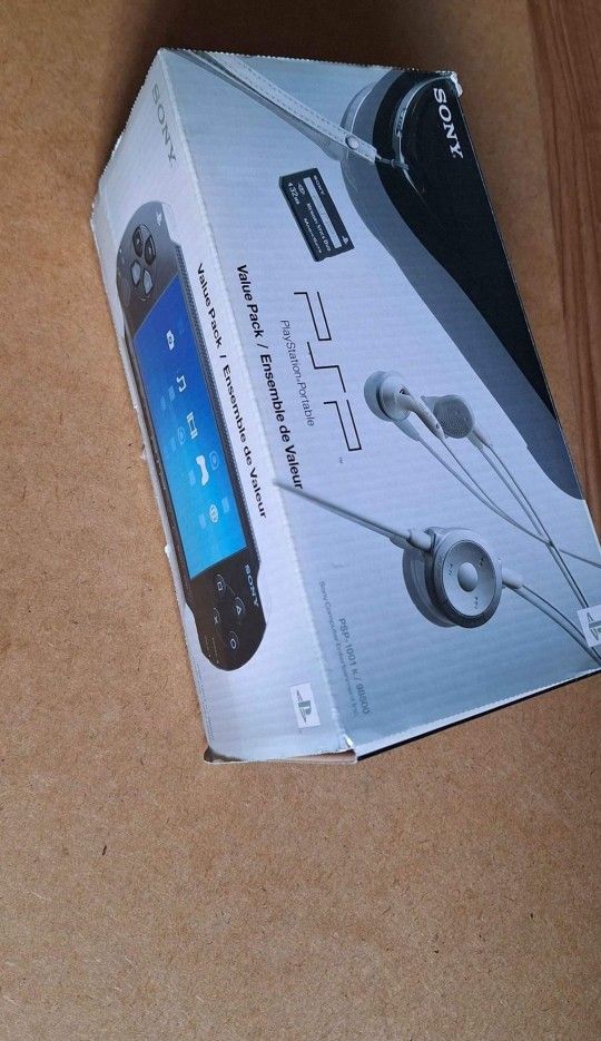 Like New Sony Psp with all Original Accessories Manual Box and Game