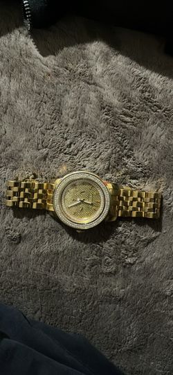 Diamond bezel gold tone tycoon watch