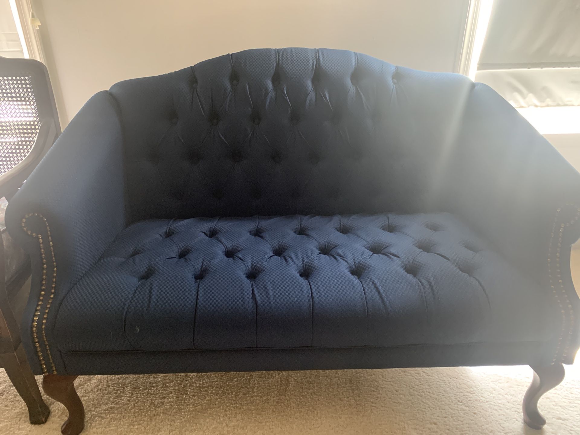 Executive love seat. Seats 2. Excellent condition for office. Navy blue . Sits in office that is never used.