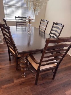 Wooden table and 6 chairs