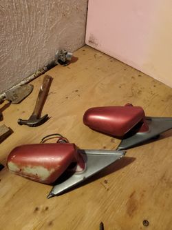 These are two driver side view mirrors Electric off of z32