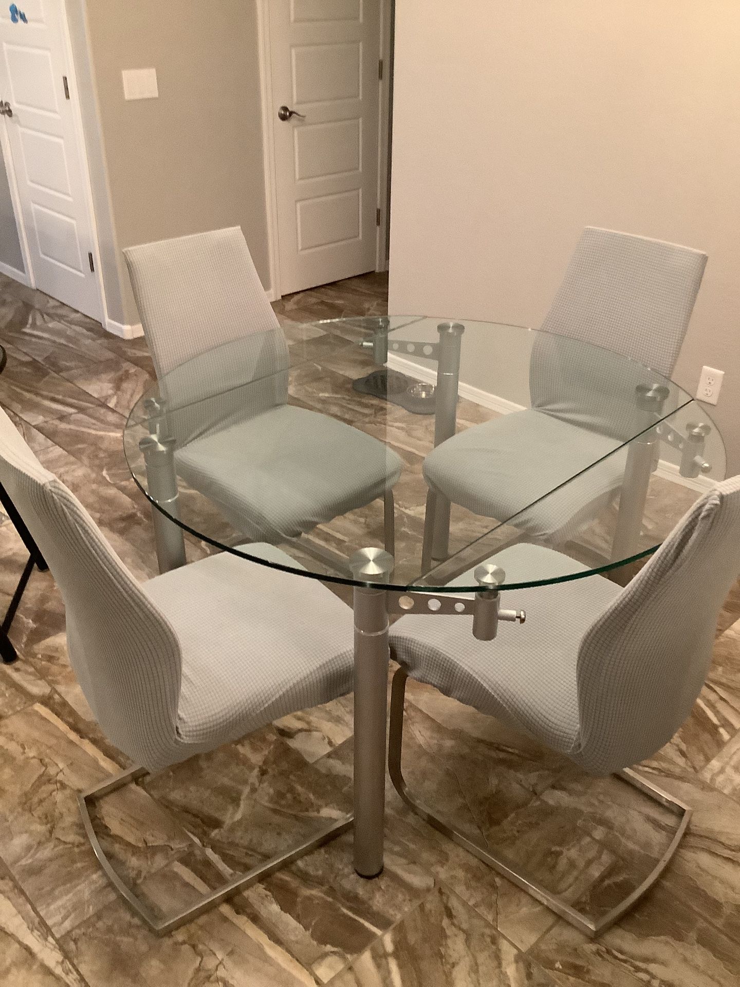 MOVING OPPORTUNITY! Unique Round Glass Table With 4 +2 Chairs
