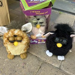 Three 90’s Furbies