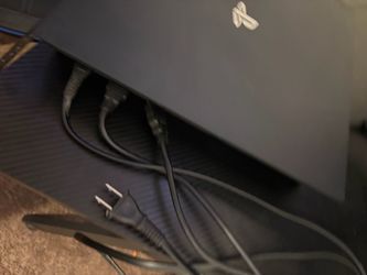 Sony PlayStation 4 Pro Console with two games (spider man 1) (modern warfare) and controller