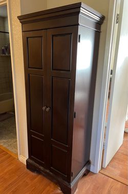 Tall storage cabinet
