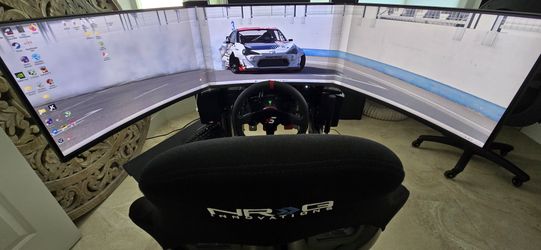 Premium Sim Racing Rig – Triple Screens, Wind & Haptics – PC Optional